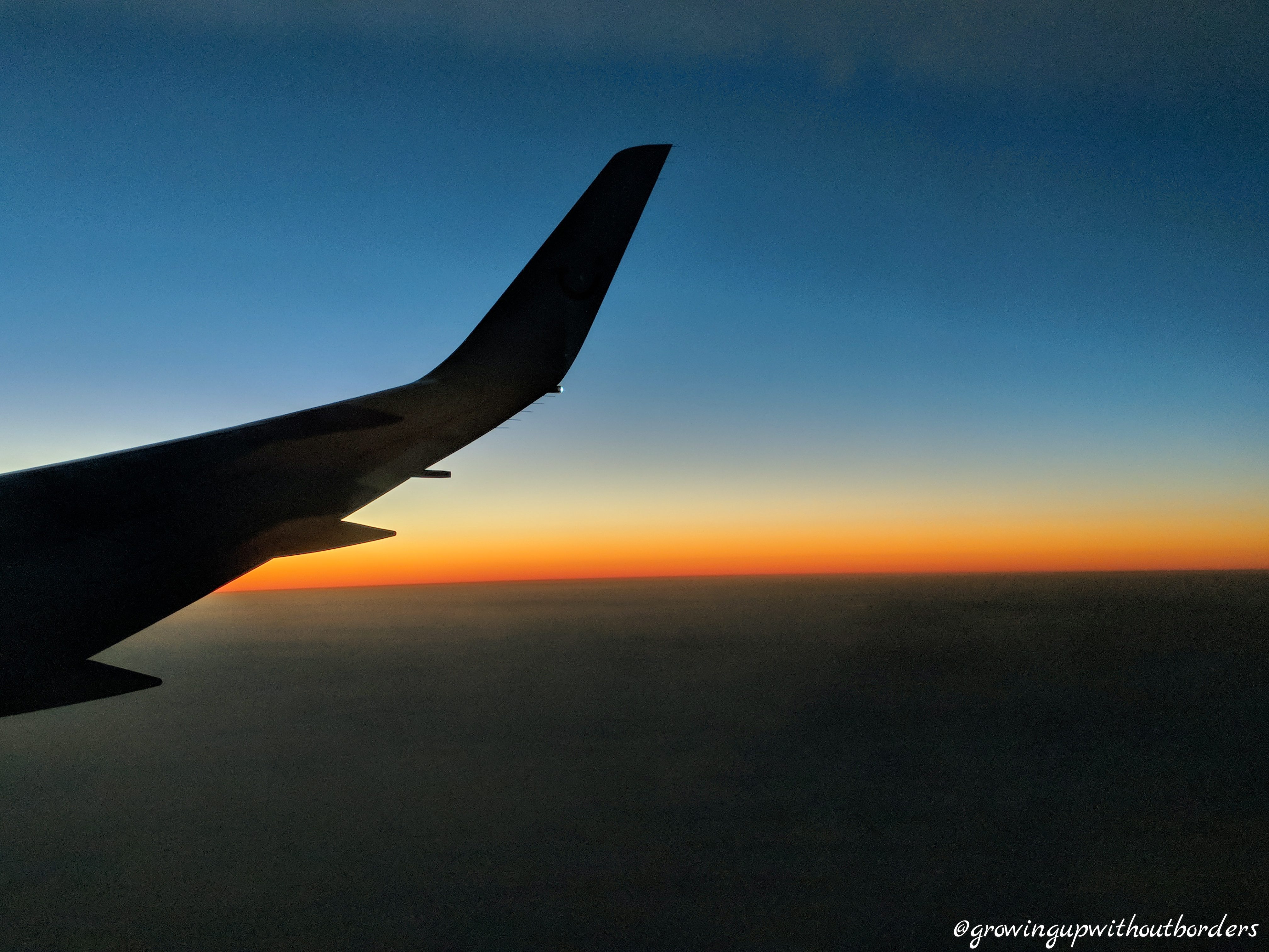 Airplane at sunrise